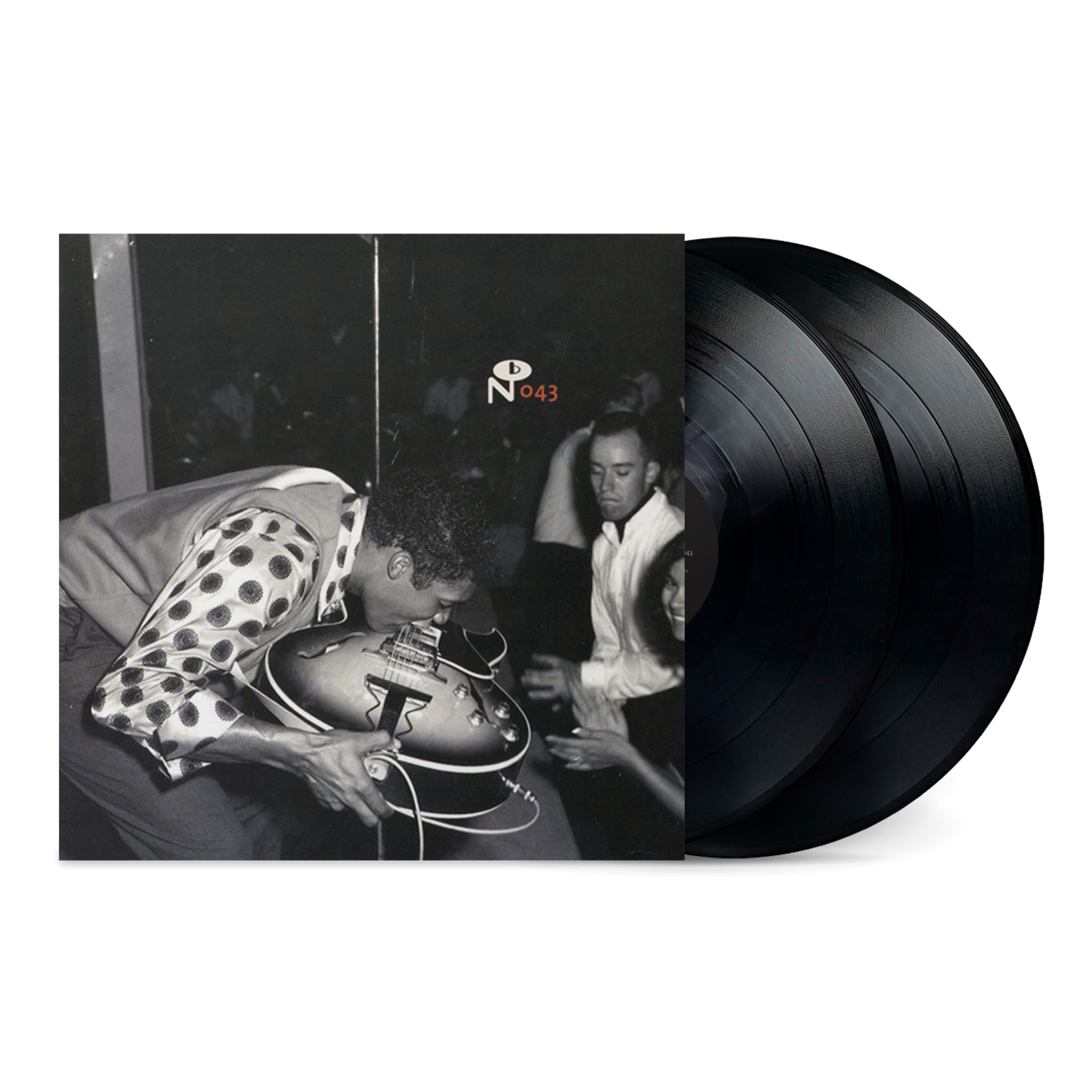 The Dynamic Label vinyl record with black and white cover showing a musician playing guitar on stage