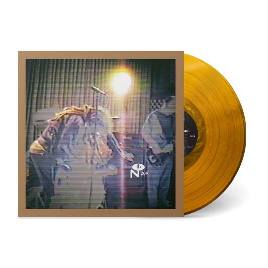 Yellow vinyl record with vintage live performance cover for Silent Dynamic Torture from Numero Group Records