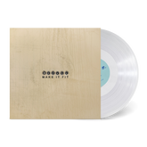 Clear vinyl record partially visible in beige sleeve with simple black text "Make It Fit" on front cover