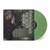 Green vinyl record partially outside its cover featuring a woman singing into a vintage microphone and the text Beehive Breaks in honeycomb shapes