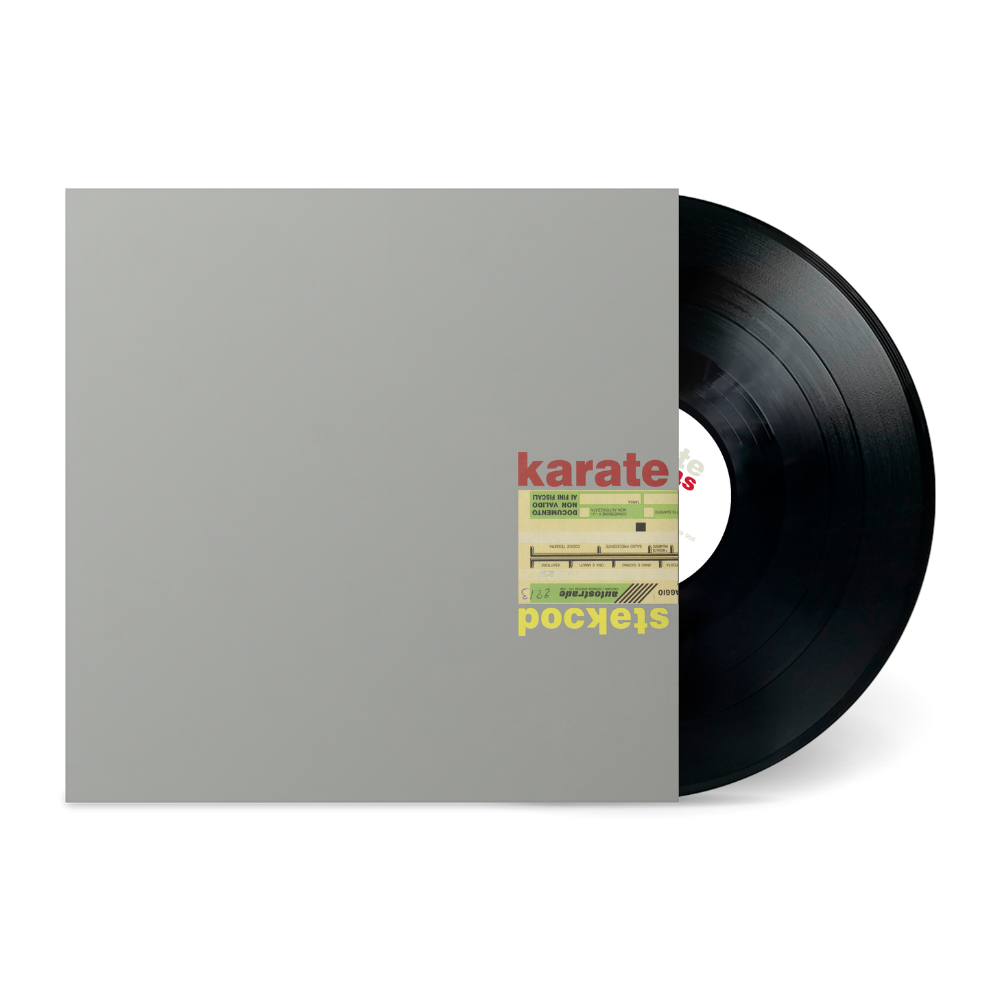 Black vinyl record partially inside a gray sleeve with a small colorful label showing the words karate and Pockets