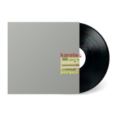 Black vinyl record partially inside a gray sleeve with a small colorful label showing the words karate and Pockets
