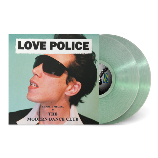 Love Police album cover featuring a man wearing sunglasses with two translucent green vinyl records behind it