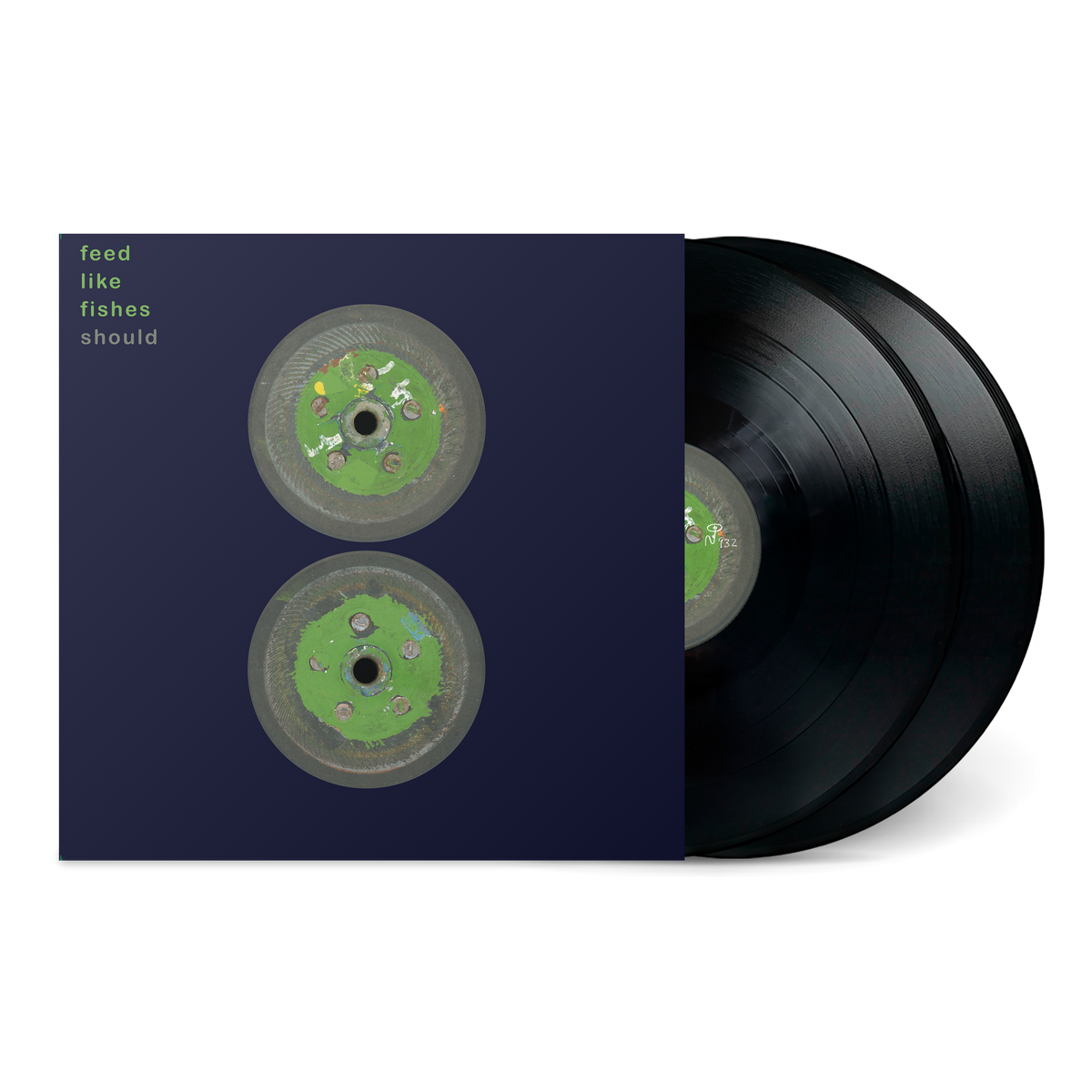 Feed Like Fishes vinyl record set with dark blue cover featuring two circular green designs and album text in lowercase letters.