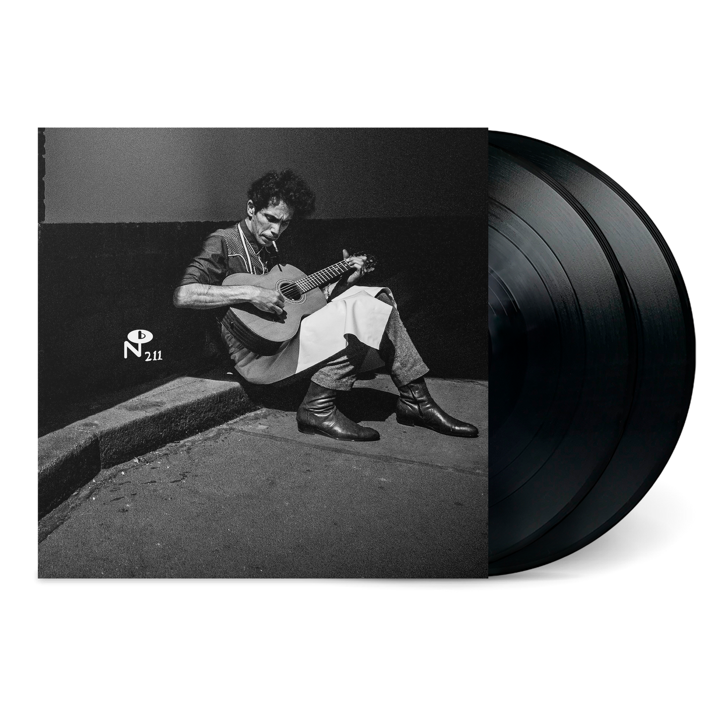 Black and white image of a man playing guitar on a street corner with Tomorrow's Gone vinyl records beside him