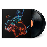 Cosmic American Music vinyl record with neon cowboy riding a bucking horse on black cover from Numero Group