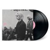 Black vinyl record partially inside a sleeve featuring a black and white photo, The Girl Group Underground album cover.