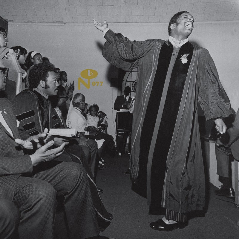 Man in choir robe passionately singing with congregation watching during church service, I Shall Wear A Crown