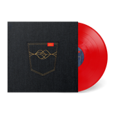 Red vinyl record partially inside a black textured sleeve with gold embroidered pocket design, titled L80s: So Unusual