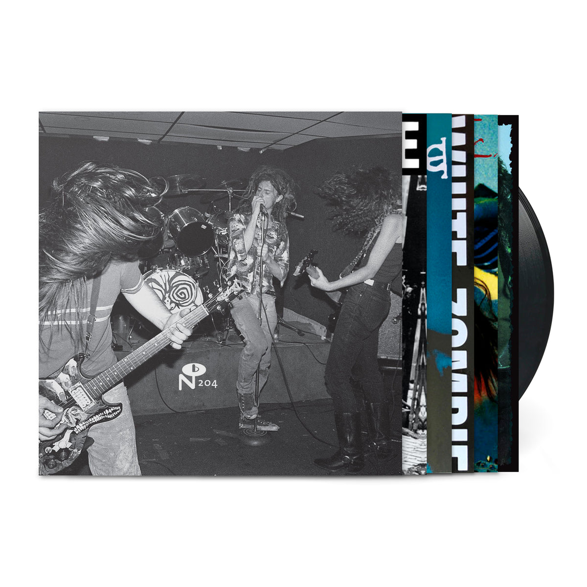 Black and white live band photo with vinyl record and colorful album inserts for It Came From N.Y.C. vinyl release