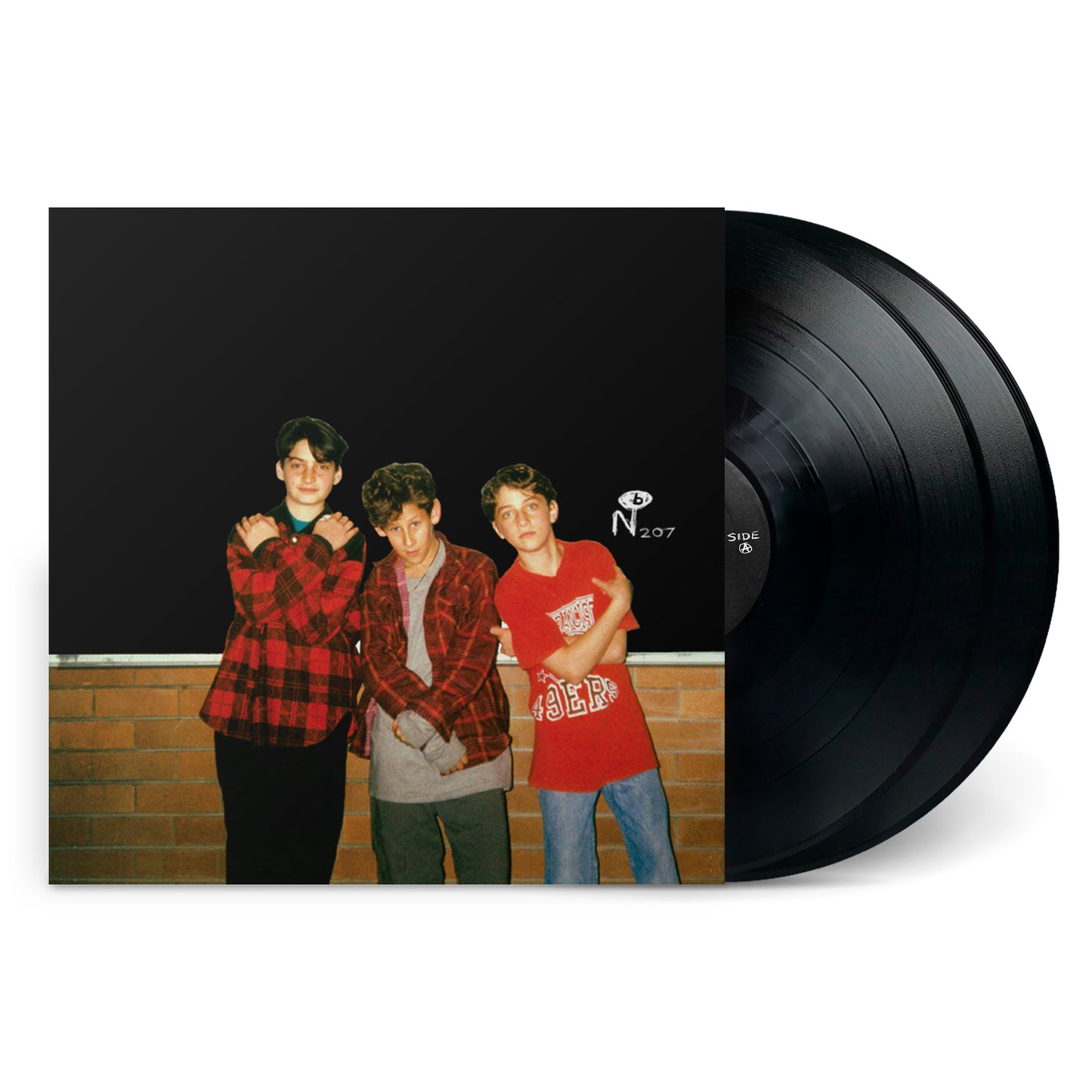 Vinyl record of 10,000 Kids With Guitars featuring a cover photo of three boys against a black background