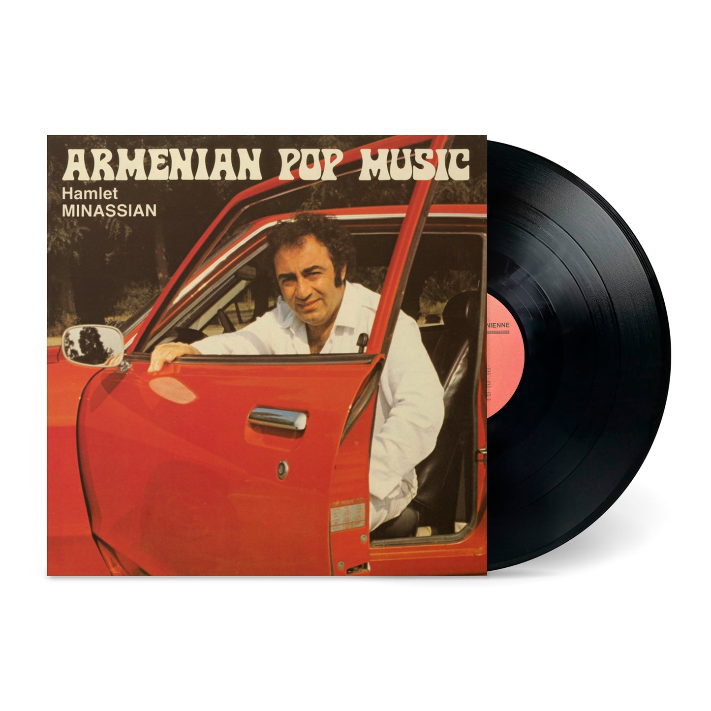Vinyl record of Armenian Pop Music featuring a man in a white shirt sitting in a red car with door open