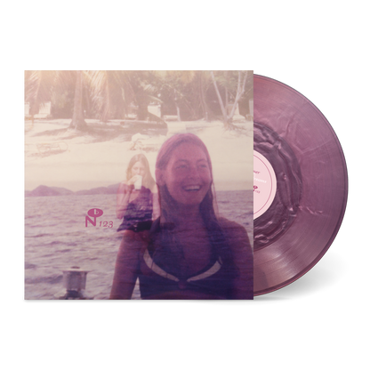Lady Full Of Dreams vinyl record with purple translucent vinyl and beach-themed cover art featuring a smiling woman