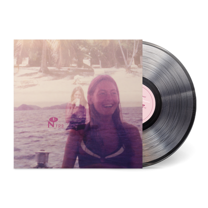 Lady Full Of Dreams vinyl record with a vintage-style cover photo featuring two women by the water at the beach