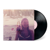 Vinyl record with cover featuring a smiling woman overlayed with a beach scene titled Lady Full Of Dreams