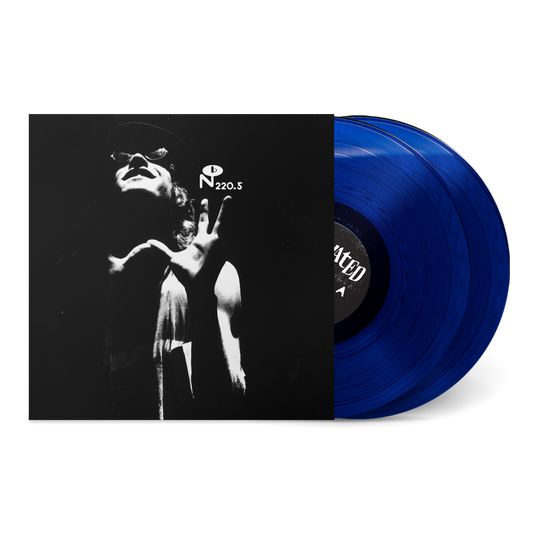 Flux vinyl record with deep blue translucent discs and black and white dramatic album cover art.