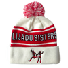 Lijadu Sisters Winter Hat in white with red stripes, pom-pom, and dancing figures embroidered on cuff