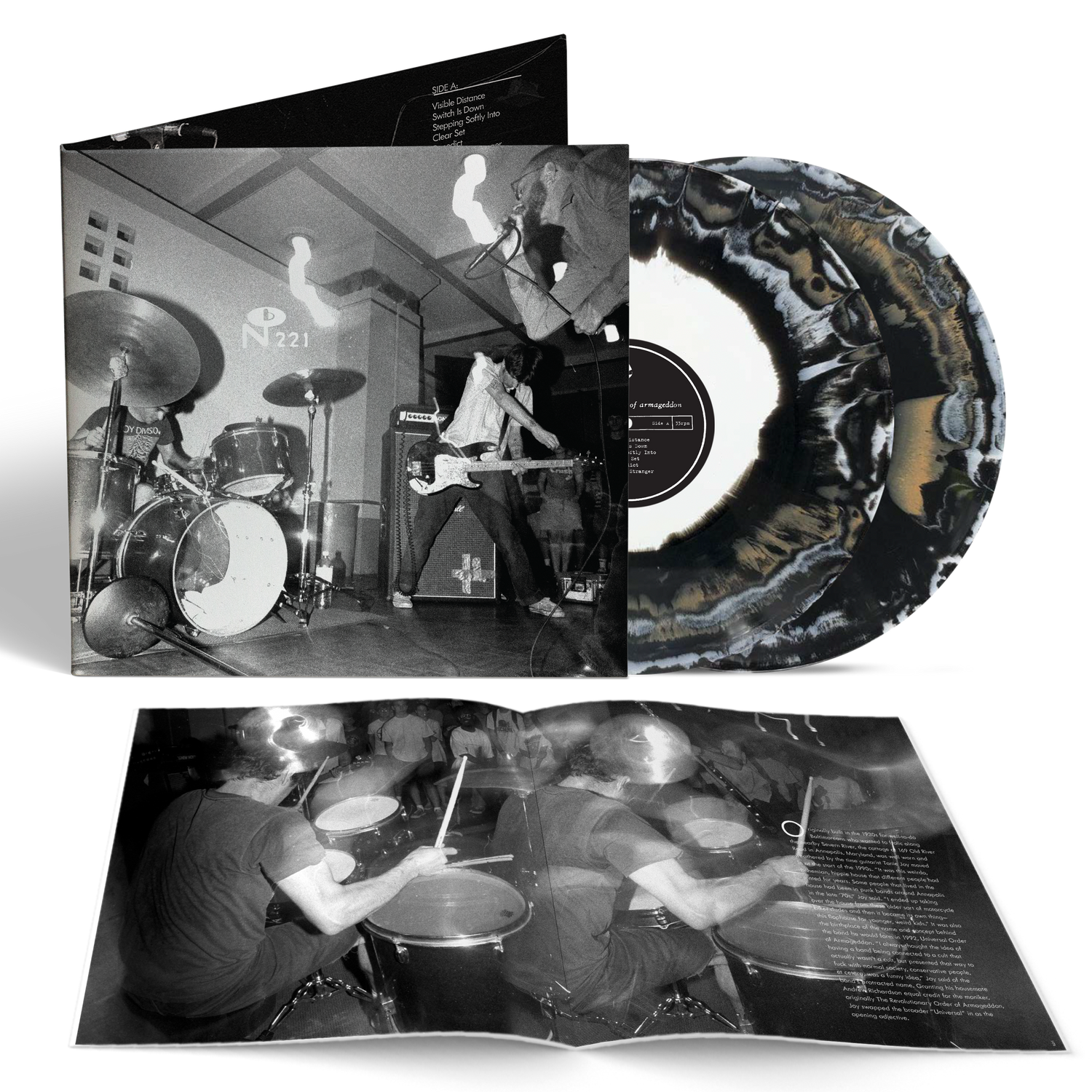 Universal Order Of Armageddon vinyl record with black and white splatter pattern, including live performance photos and booklet.