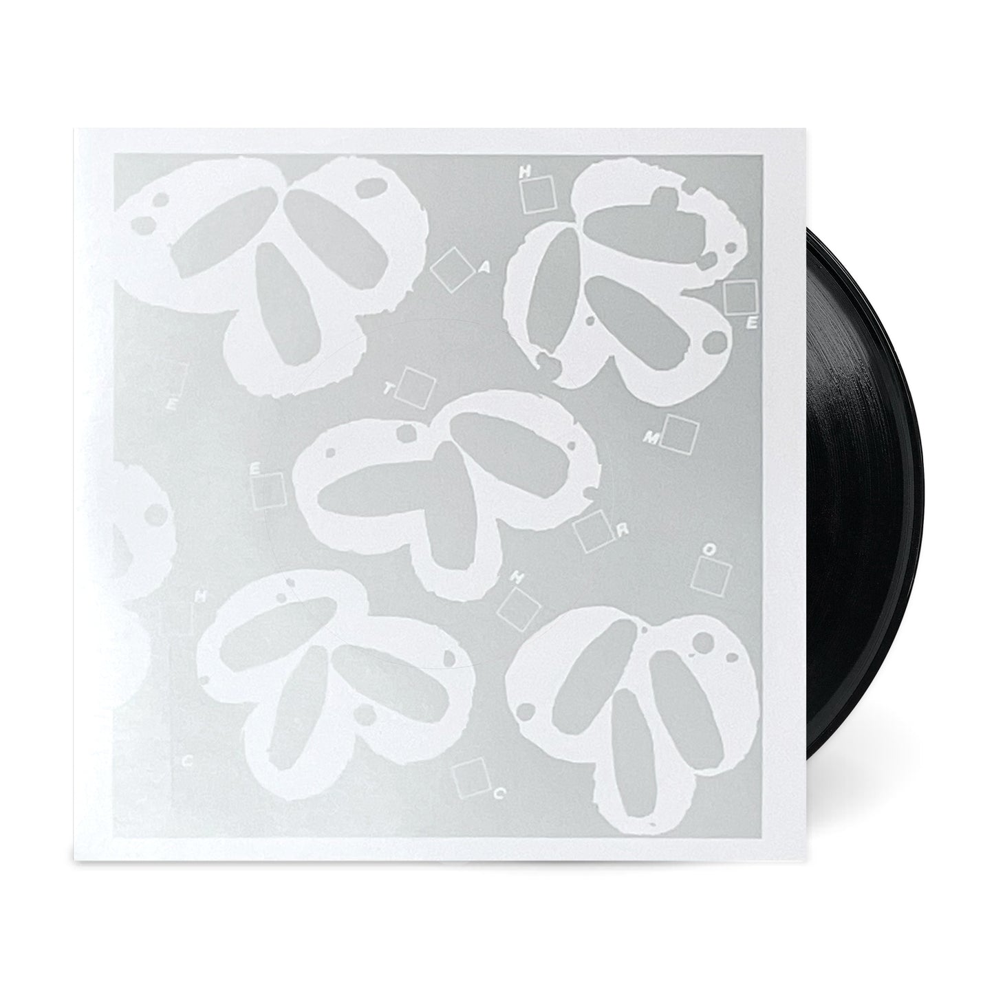 Black vinyl record partially inside a silver and white sleeve for Still Wanna Die b/w Take Me Home.