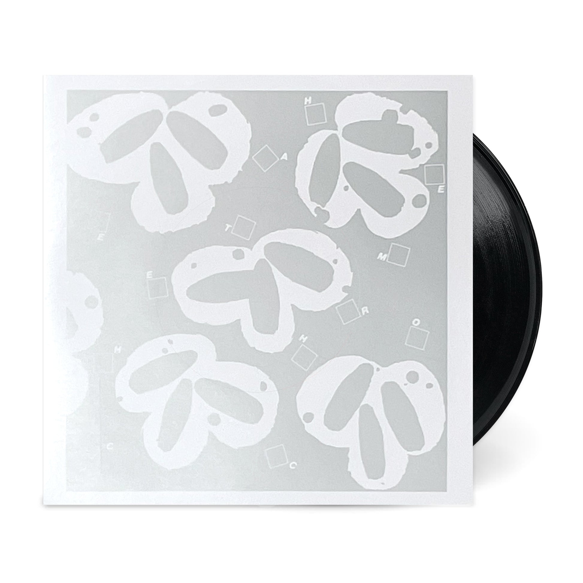Black vinyl record partially inside a silver and white sleeve for Still Wanna Die b/w Take Me Home.