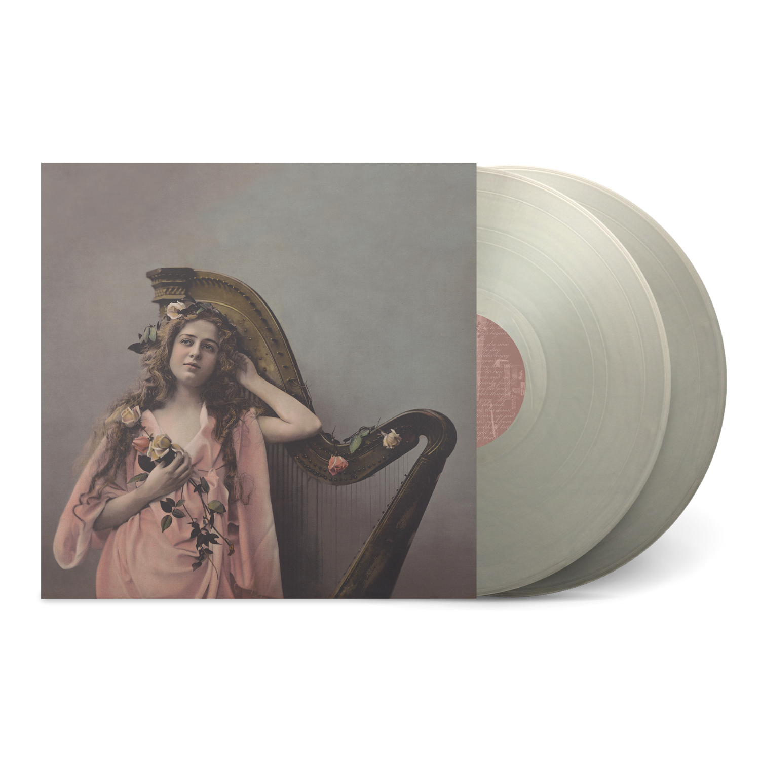C album with vintage-style cover featuring woman in pink dress holding flowers next to a harp, clear vinyl records shown